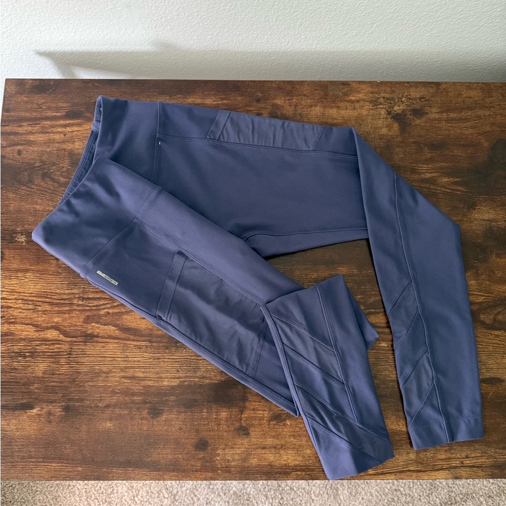 Periwinkle leggings with mesh side pockets and ankle detail